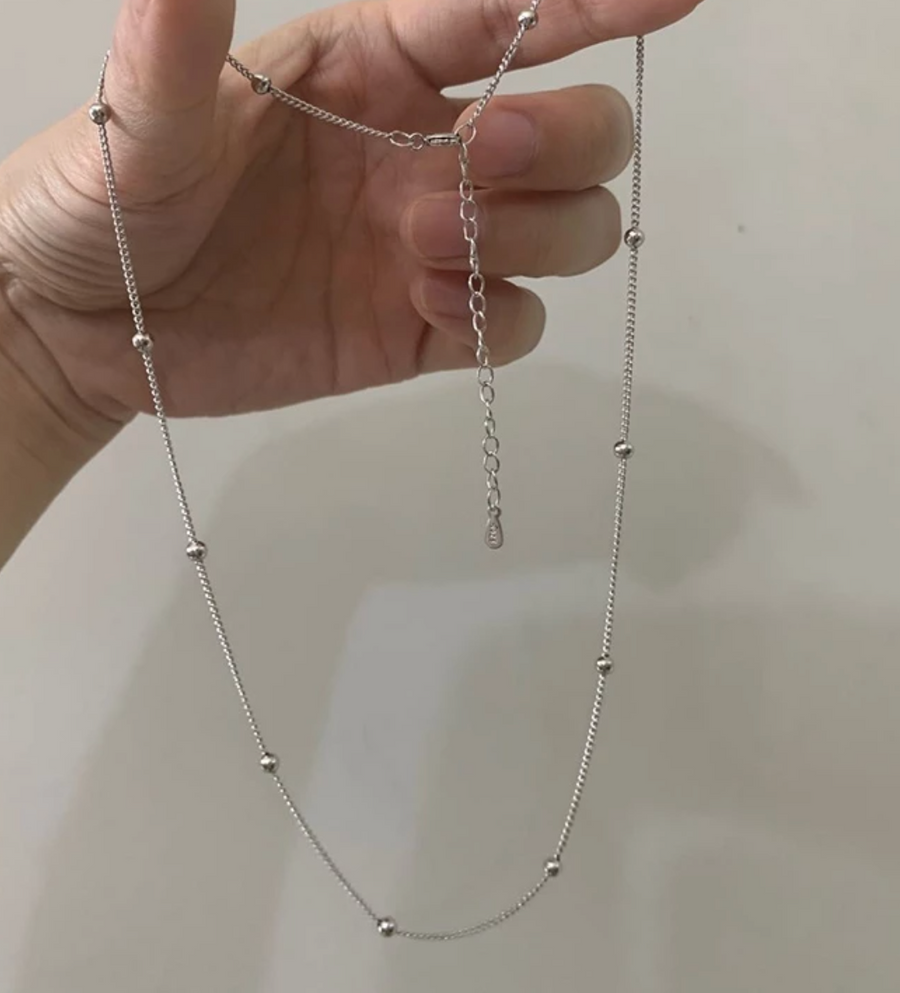 Necklace with small balls